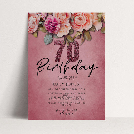 A pink birthday invitation with a floral design and the number 70.