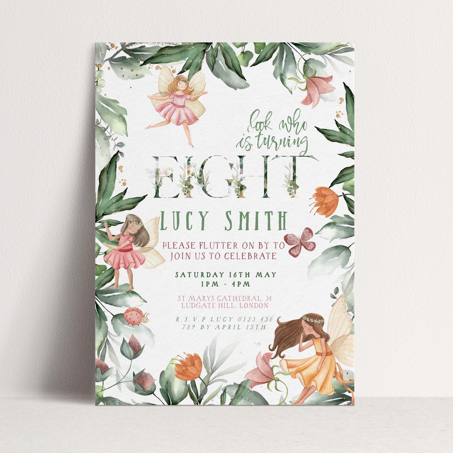 The image is a birthday invitation featuring a whimsical design with fairies, flowers, and leaves.