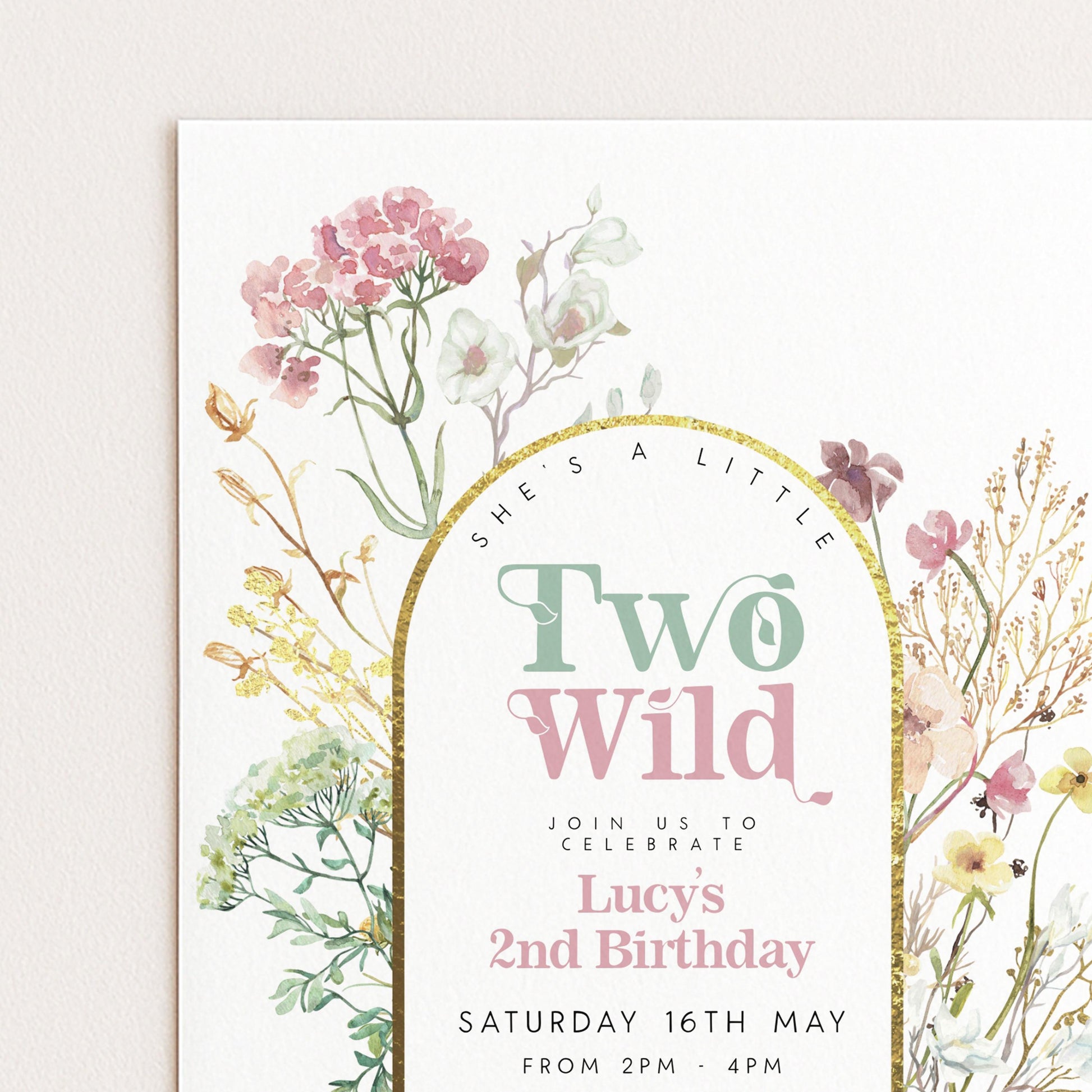 A floral-themed birthday invitation for a two-year-old named Lucy, celebrating her second birthday.