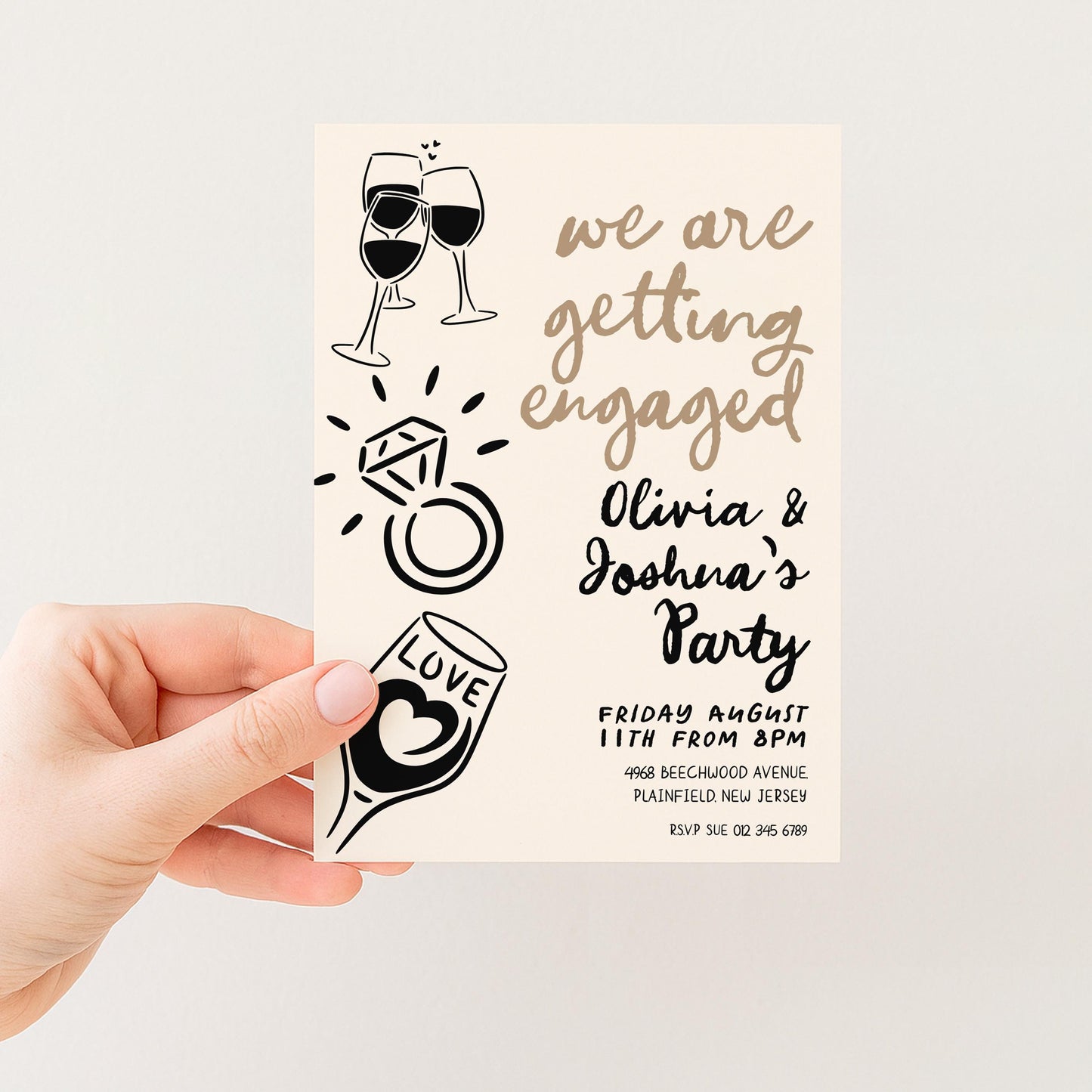 The image is a hand holding a wedding invitation card with various decorative elements and text.