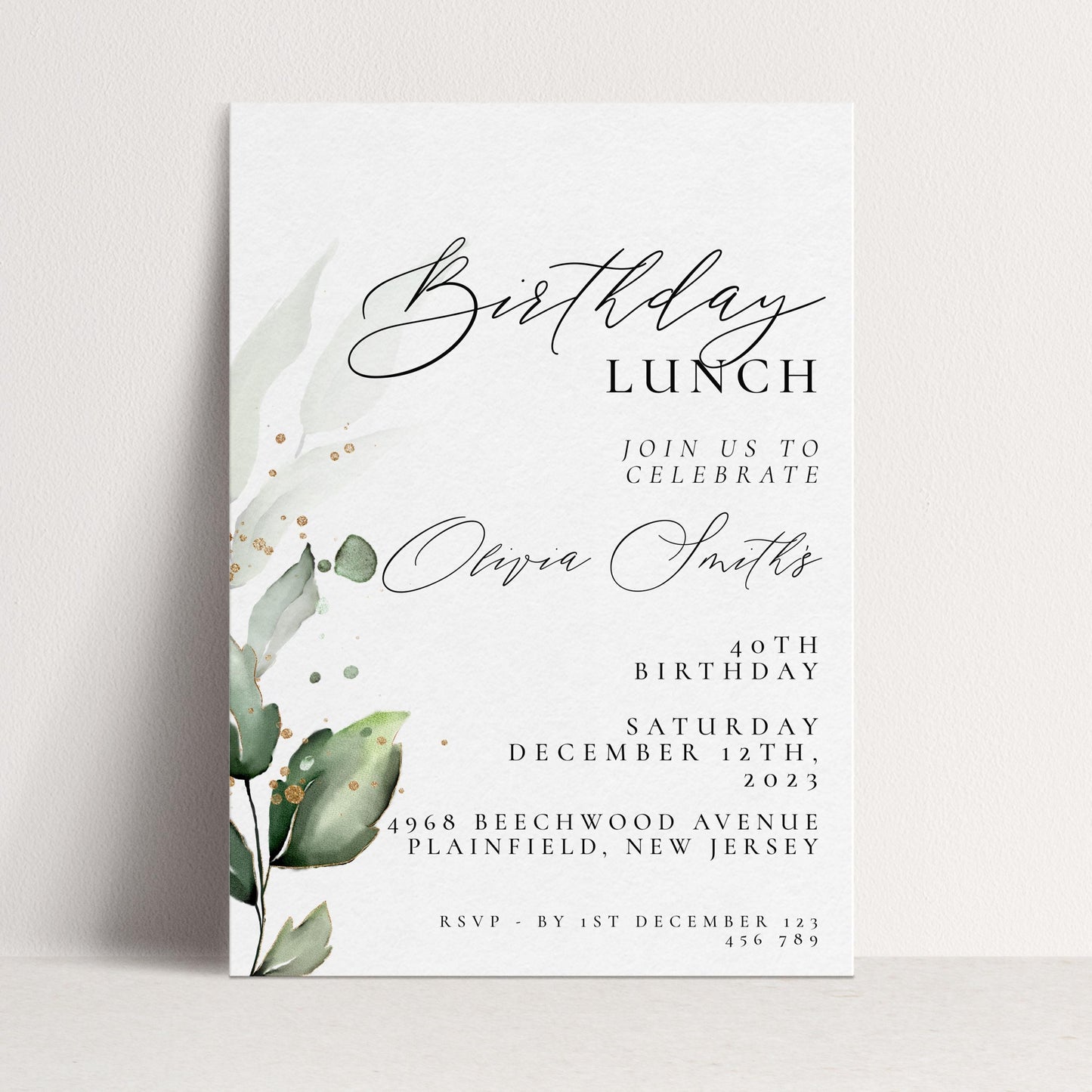 The image is a birthday invitation card with a white background and a watercolor design of green leaves. The text invites guests to a birthday lunch celebration on Saturday, December 12th, 2023, at 4968 Beechwood Avenue in Plainfield, New Jersey. The invitation includes details about the event, such as the RSVP date and location.