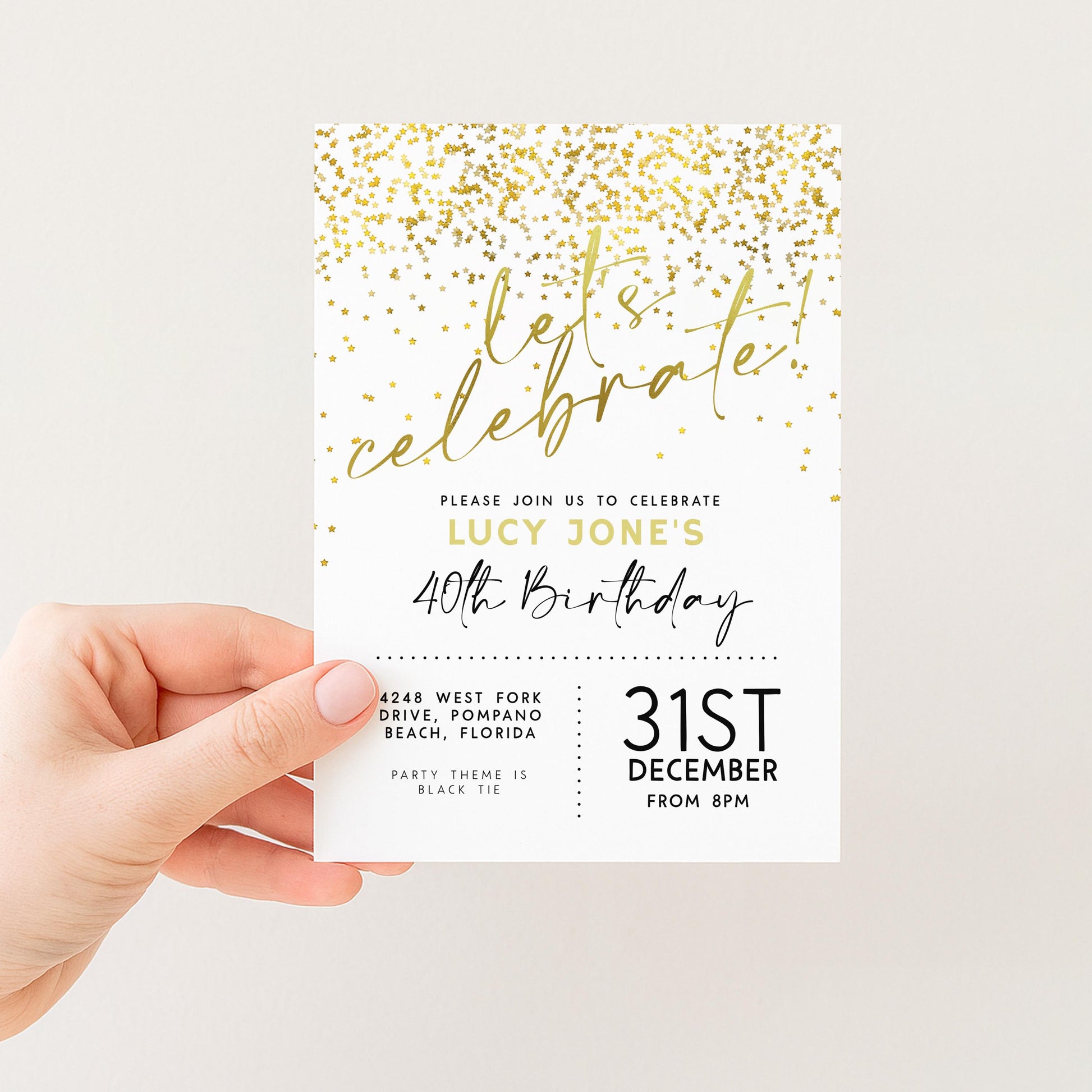 a hand holding a birthday invitation card with a gold glitter design and text.