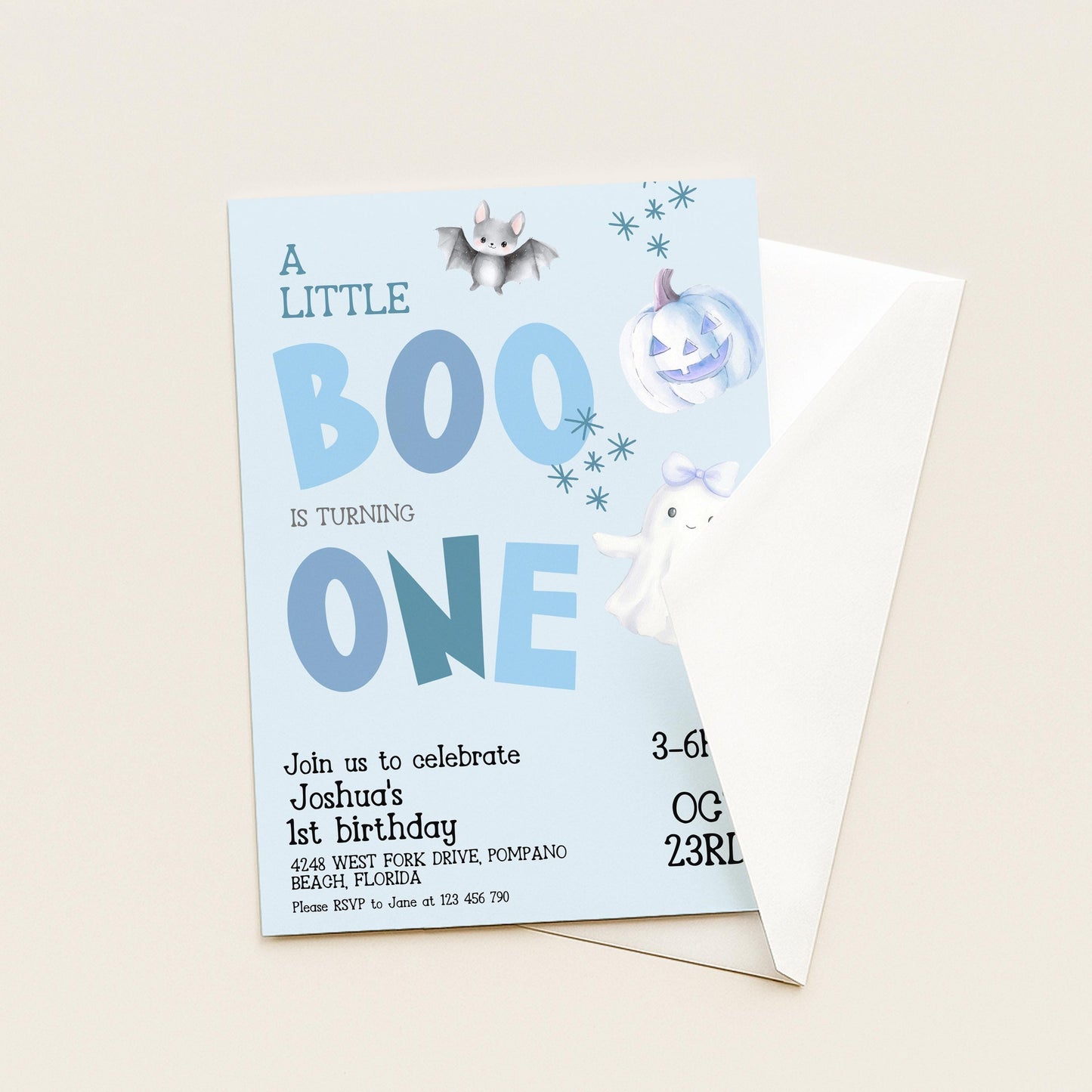 A birthday invitation for a little boy named Joshua's first birthday, featuring a Halloween theme with bats, pumpkins, and ghost decorations.