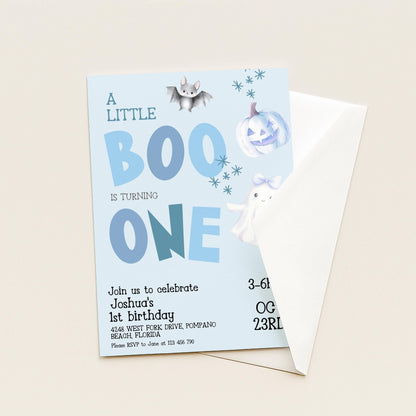 A birthday invitation for a little boy named Joshua's first birthday, featuring a Halloween theme with bats, pumpkins, and ghost decorations.
