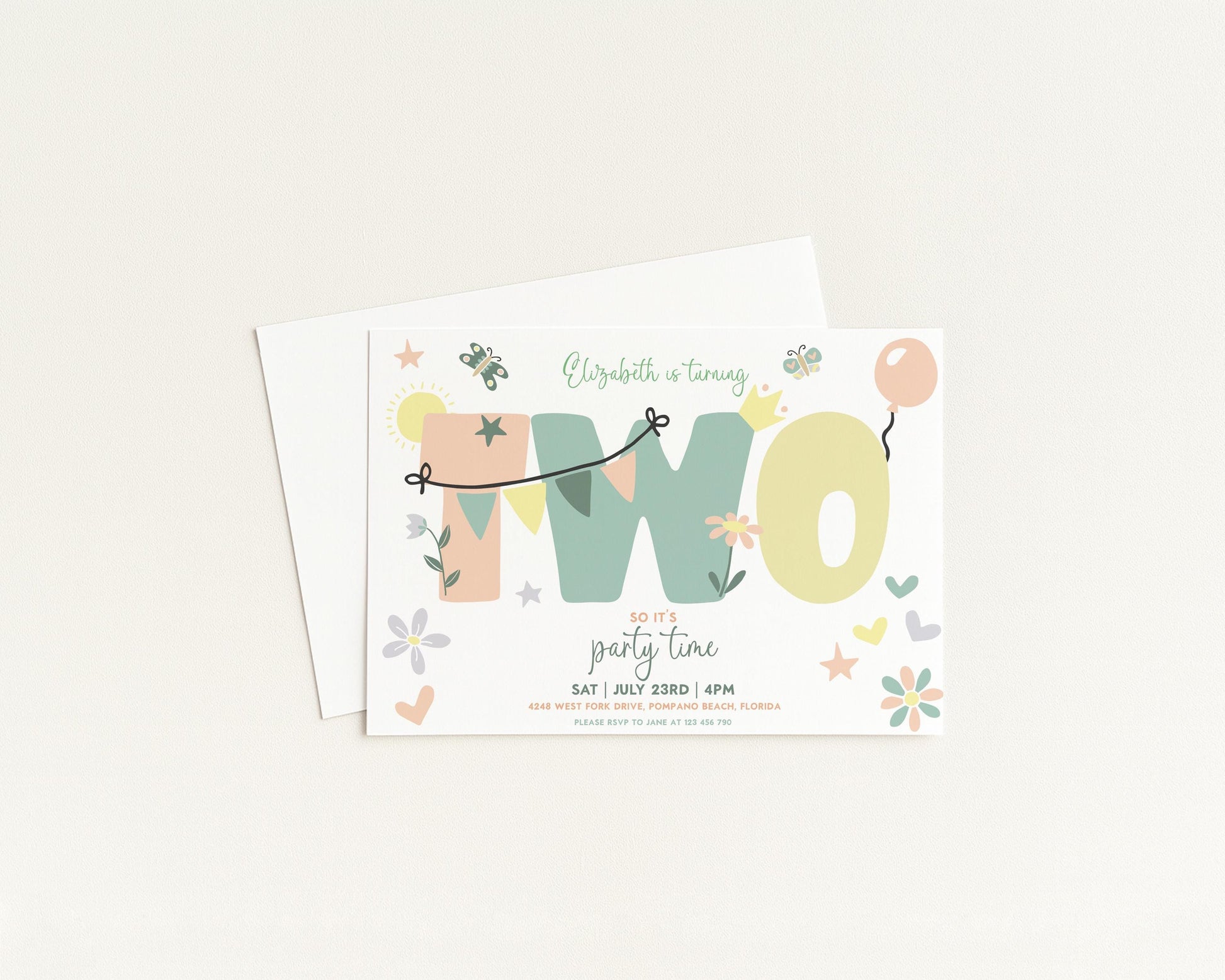 A birthday party invitation for a two-year-old named Elizabeth, featuring a colorful design with the number "TWO" and various decorative elements such as balloons, flowers, and stars.