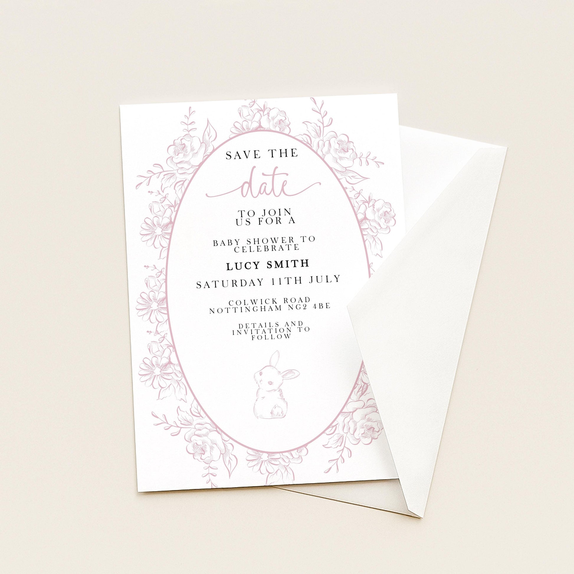 The image is a white invitation card with pink floral designs and text, inviting guests to a baby shower for Lucy Smith.