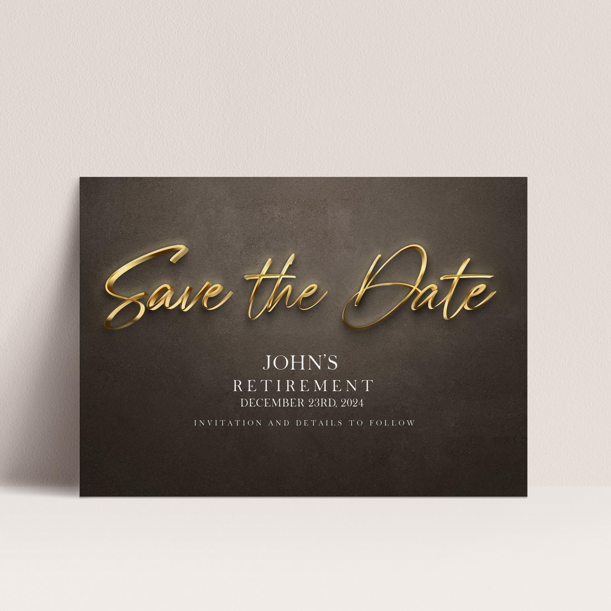 The image is a black and white photograph of a wedding invitation card with gold text and details about John's retirement.