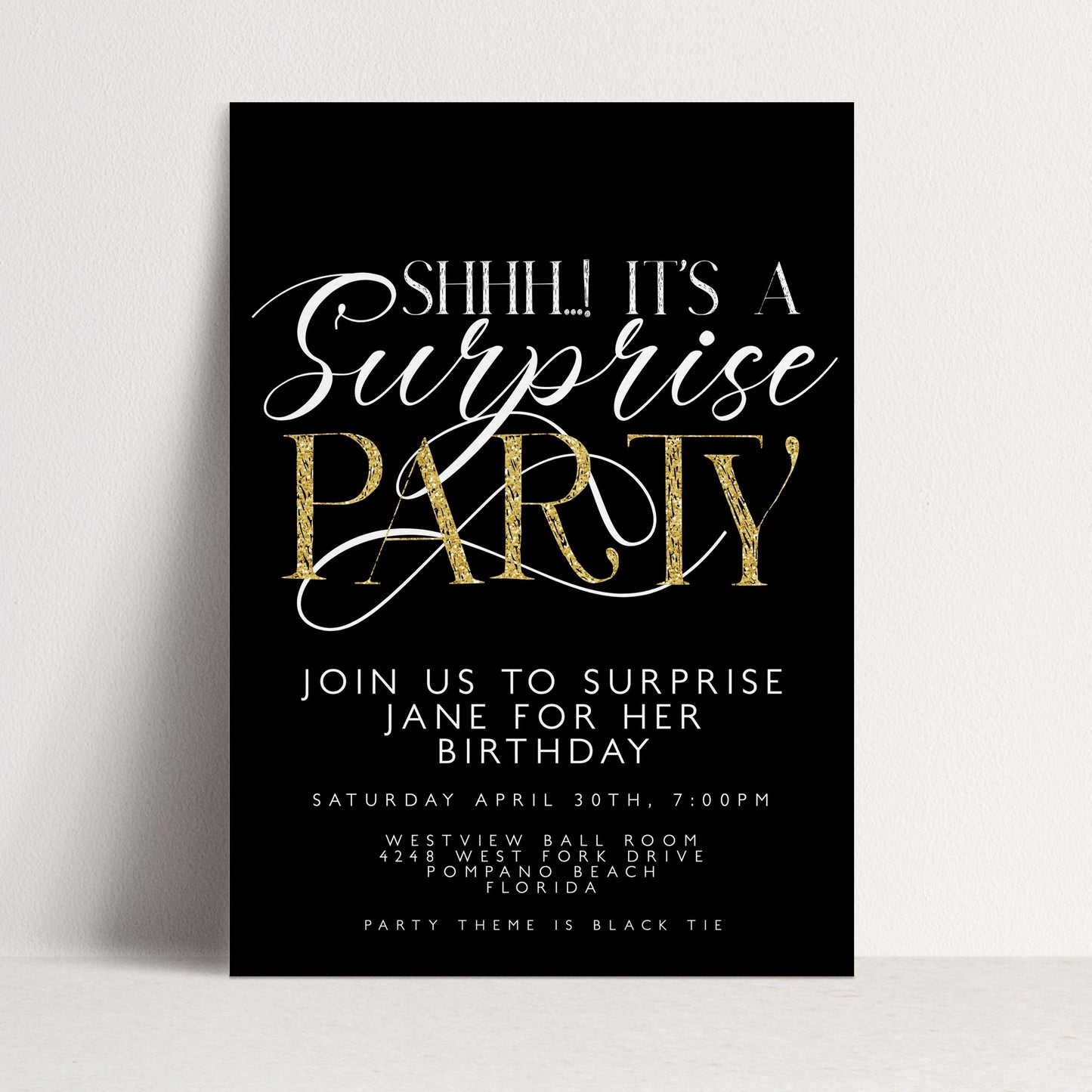 The image is a black and white invitation card for a surprise party.