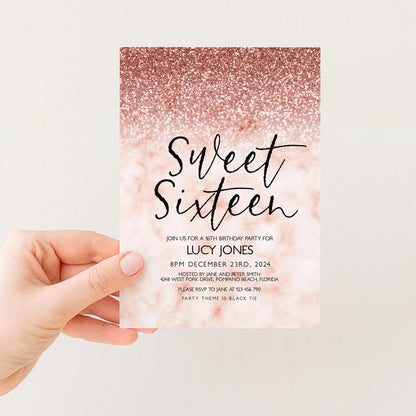 a hand holding a pink and gold glittery invitation card for a 16th birthday party.