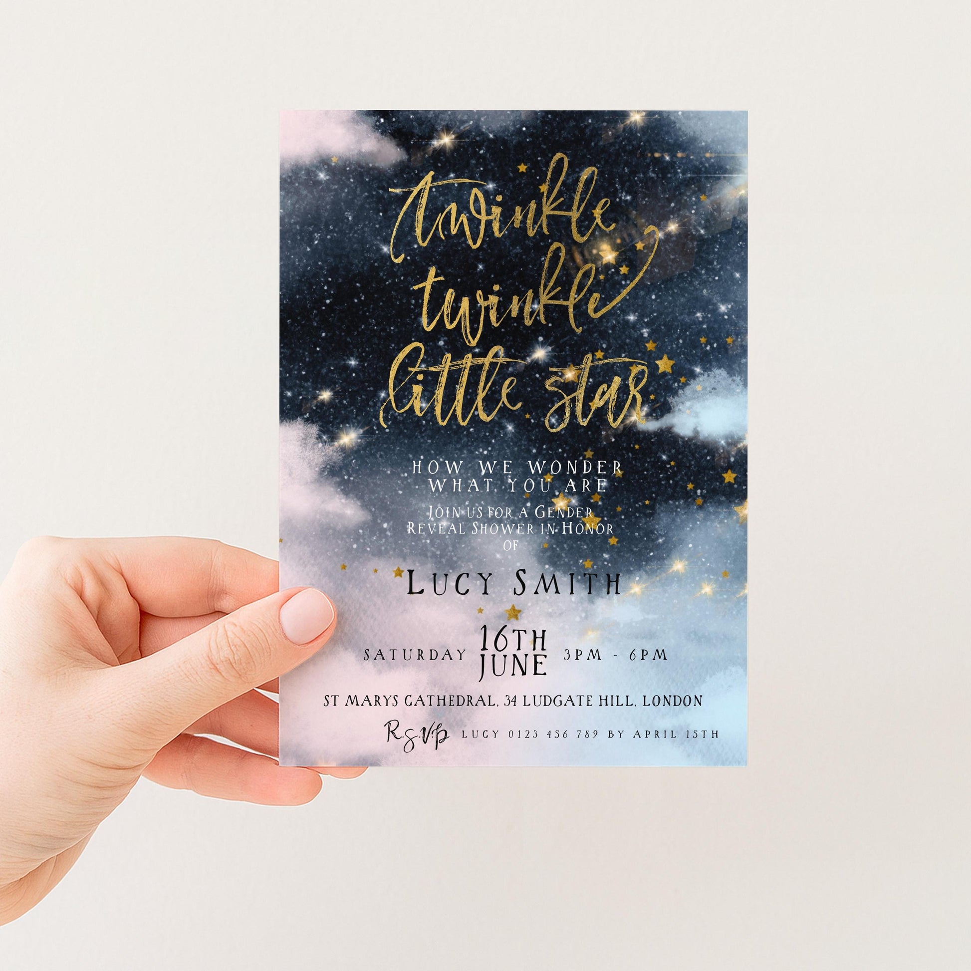 The image is a hand holding a printed invitation card with a starry night sky background and text.
