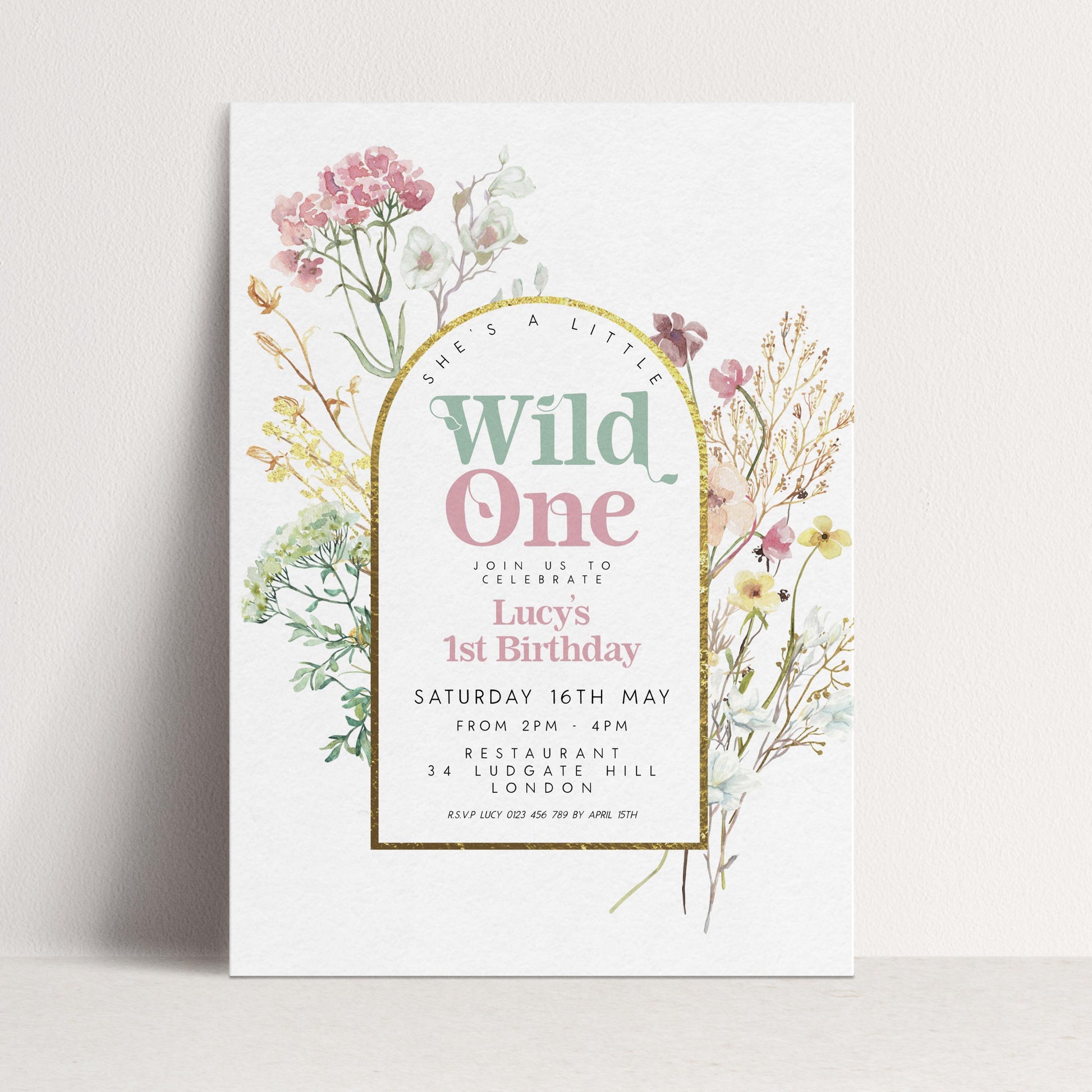 The image is a birthday invitation for a girl named Lucy's 1st birthday.