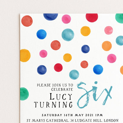 The image is a colorful invitation card for a birthday party, featuring a variety of colorful dots and text inviting guests to celebrate Lucy's sixth birthday.