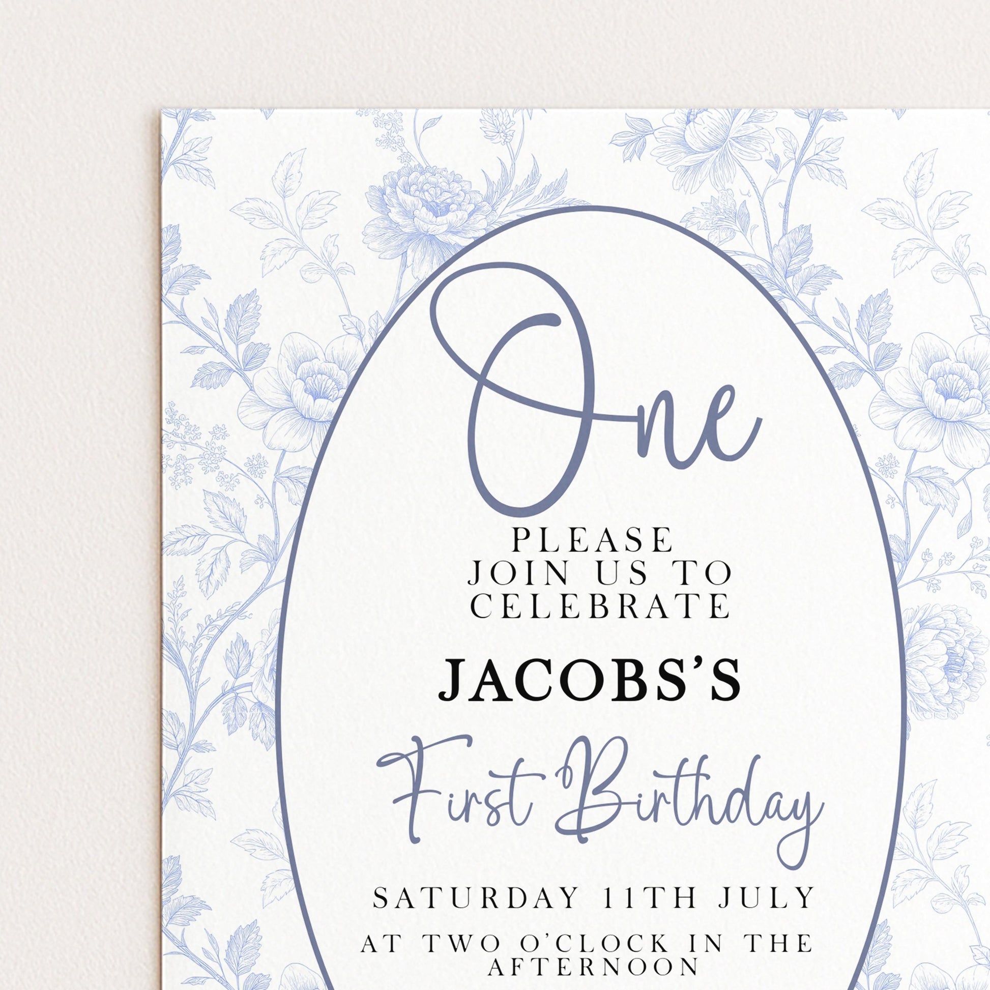 The image is a birthday invitation for Jacob's first birthday. It features a floral pattern and includes text inviting guests to join the celebration.