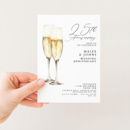 The image is a wedding anniversary invitation card featuring champagne glasses and the text "25th Anniversary" along with details about the celebration.