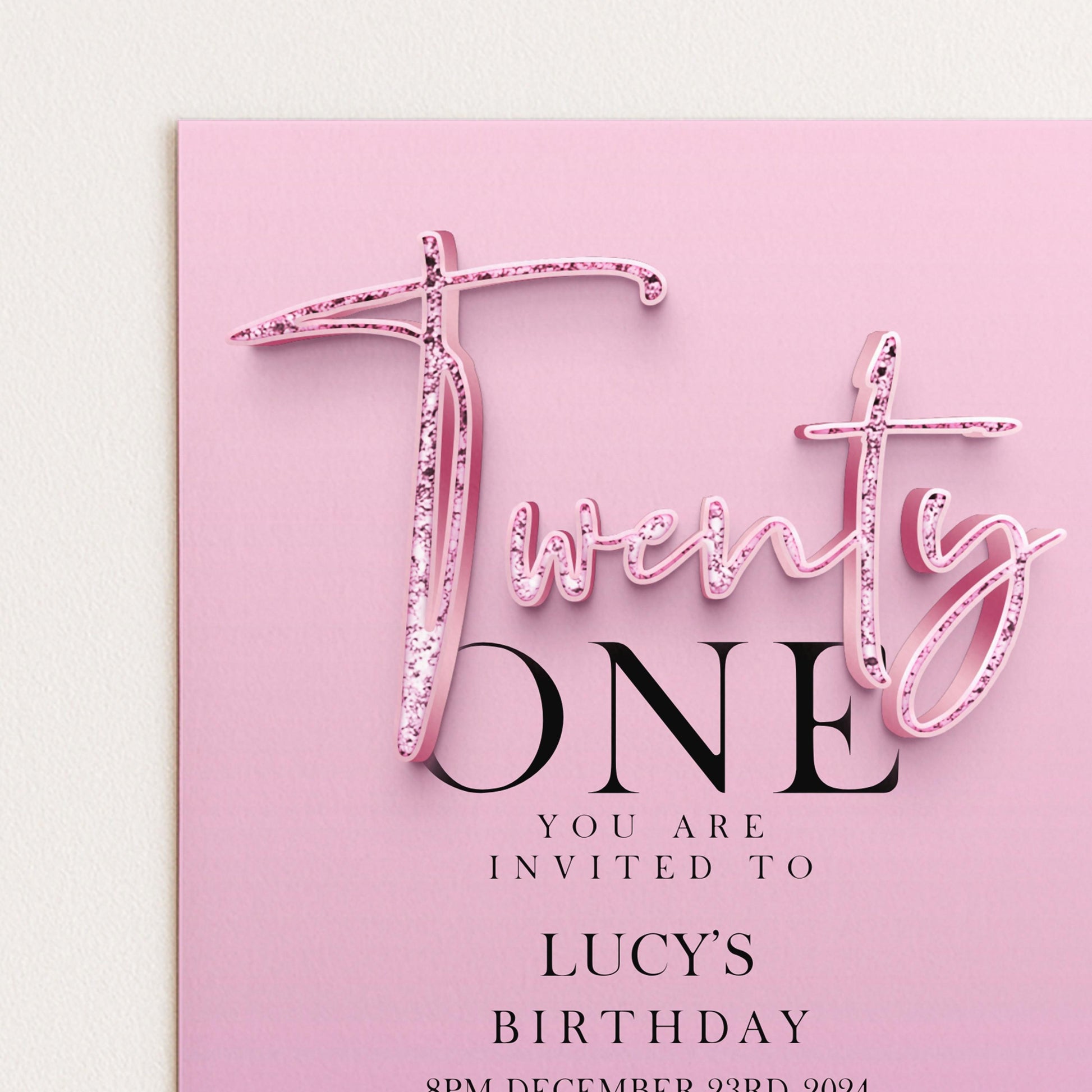 The image is a pink birthday invitation card for a one-year-old named Lucy.