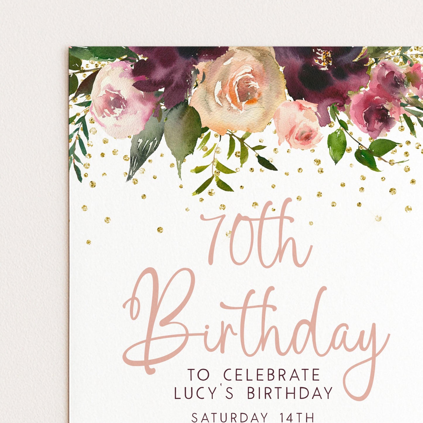The image is a birthday invitation for a 70th birthday celebration for a person named Lucy.