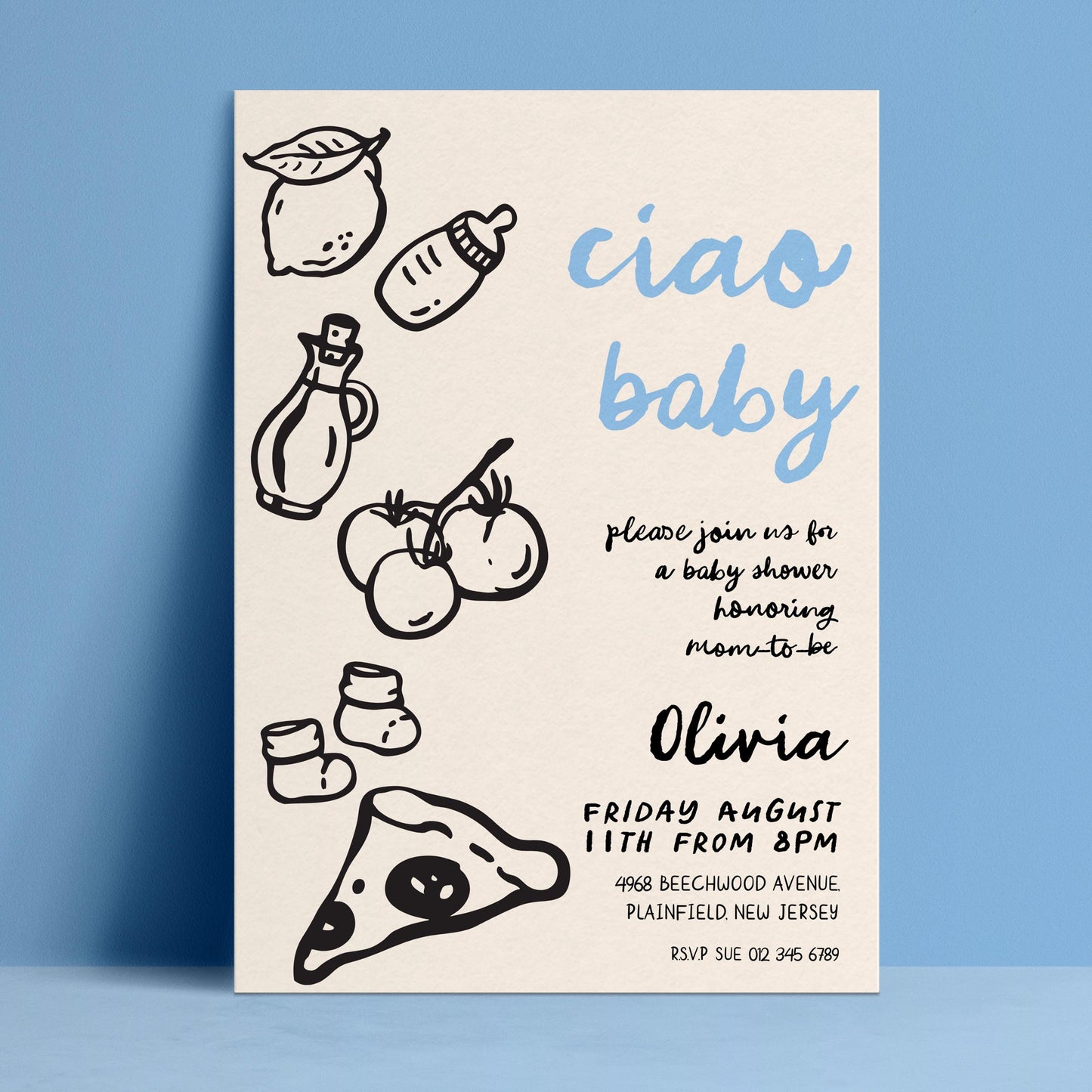 The image is a baby shower invitation featuring a blue background with various baby-related items such as a bottle, a baby bootie, and a slice of pizza.