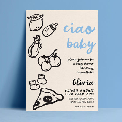 The image is a baby shower invitation featuring a blue background with various baby-related items such as a bottle, a baby bootie, and a slice of pizza.