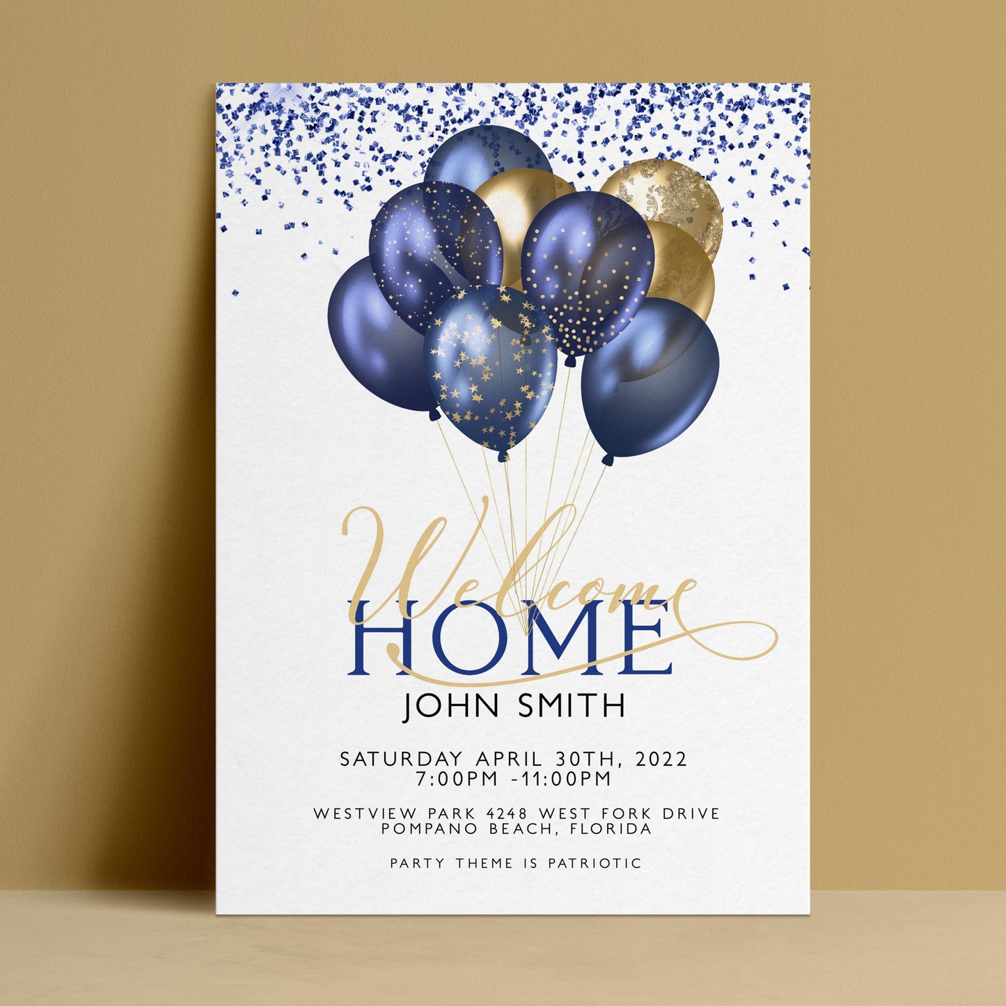 The image is a welcome home invitation card featuring blue and gold balloons, with the text "Welcome Home John Smith" prominently displayed.