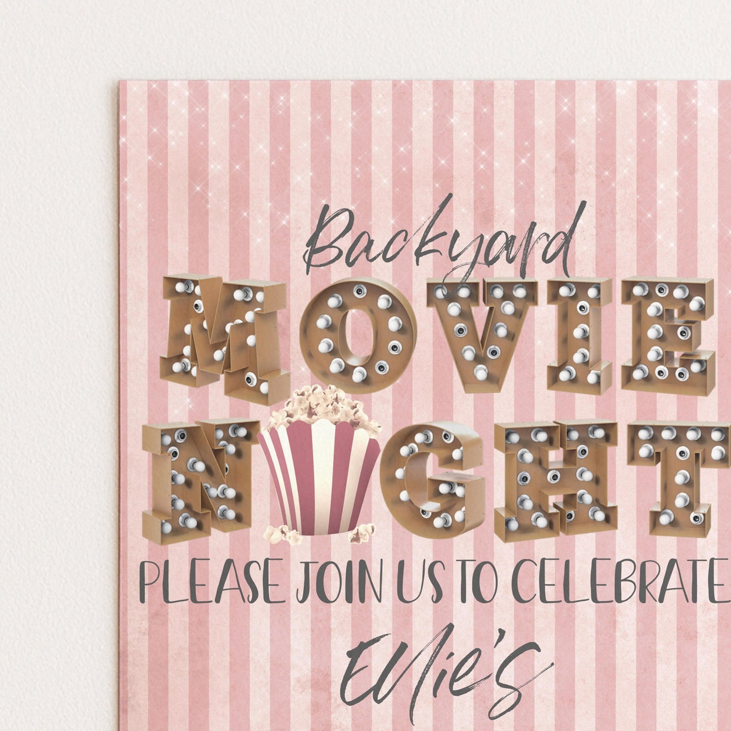 The image is a pink and white striped poster advertising a backyard movie night. It features the words "Backyard Movie Night" in a decorative font, with a popcorn bucket and a "Please join us to celebrate" invitation below.