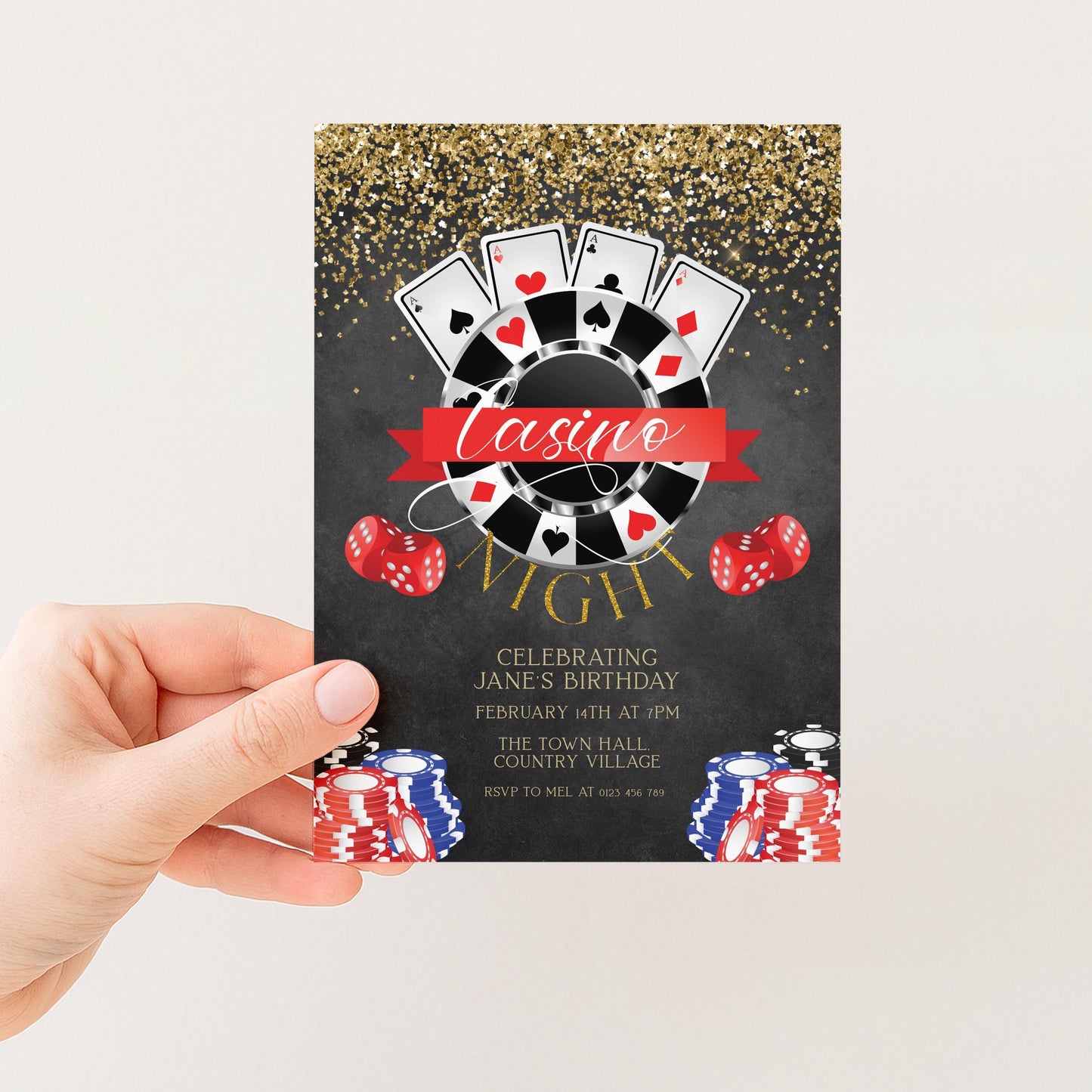 A hand holding a casino-themed invitation card with a casino motif, including playing cards, poker chips, and a roulette wheel.