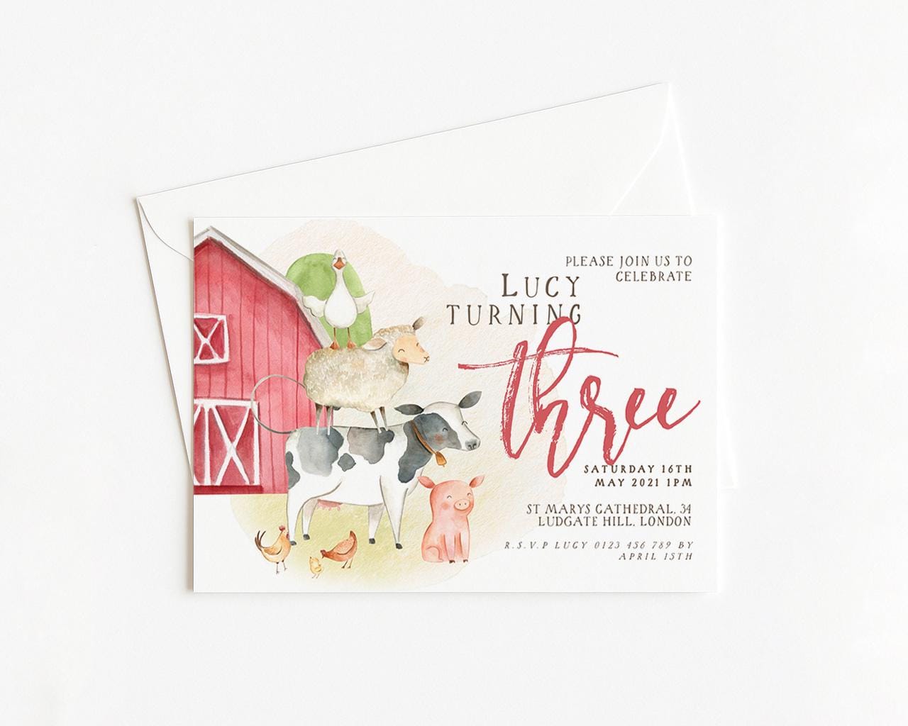 The image is a birthday invitation for a girl named Lucy, who is turning three years old. The invitation features illustrations of farm animals and a red barn, along with the text "Please join us to celebrate Lucy turning three".