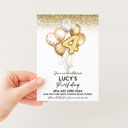 a person holding a birthday invitation card with a gold glitter design and balloons.