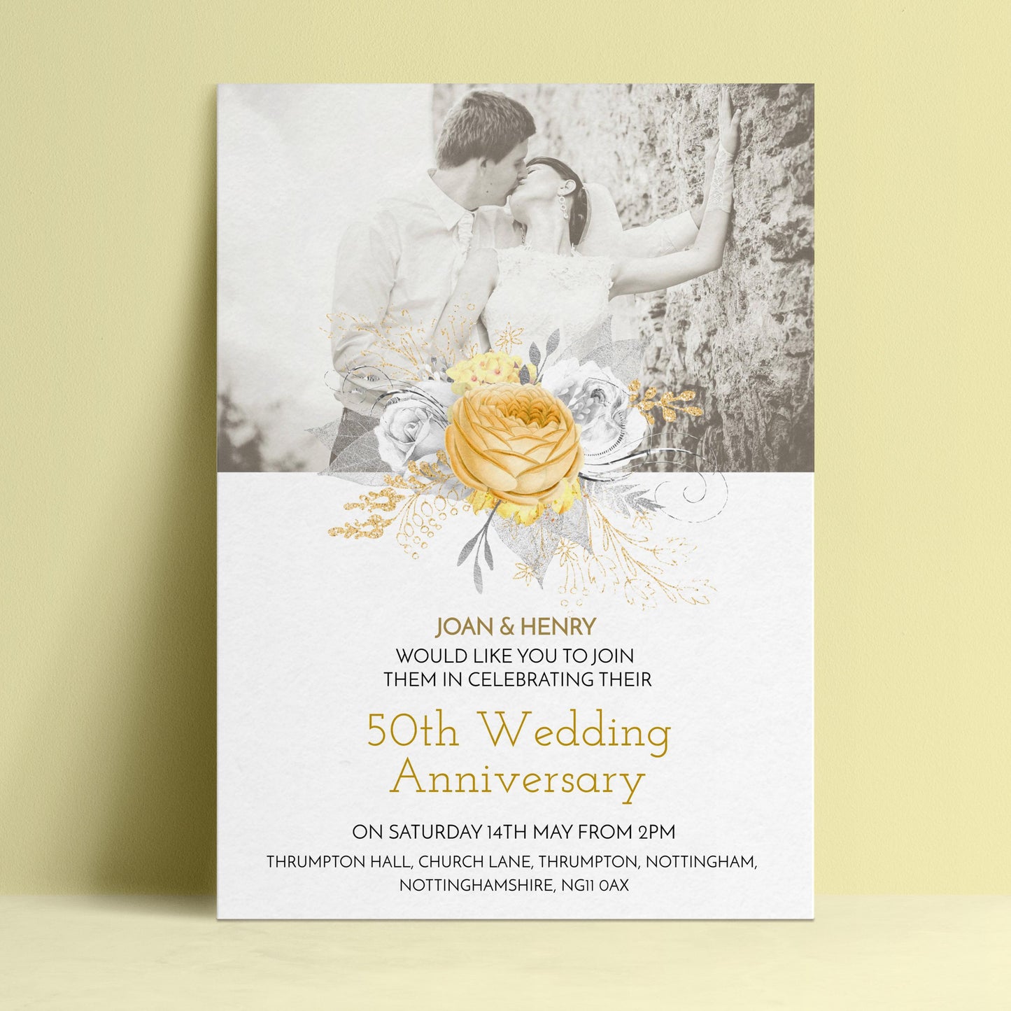 The image is a wedding anniversary invitation featuring a couple embracing and a large yellow rose.
