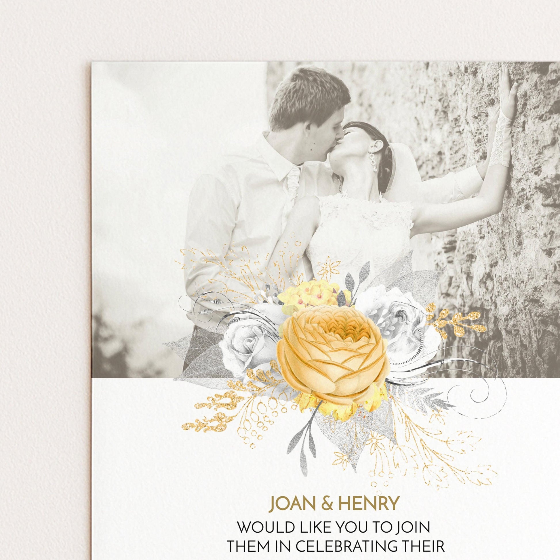 A black and white photograph of a couple embracing, with a large yellow rose in the center surrounded by smaller flowers and leaves. The text below the image reads "JOAN & HENRY WOULD LIKE YOU TO JOIN THEM IN CELEBRATING THEIR".