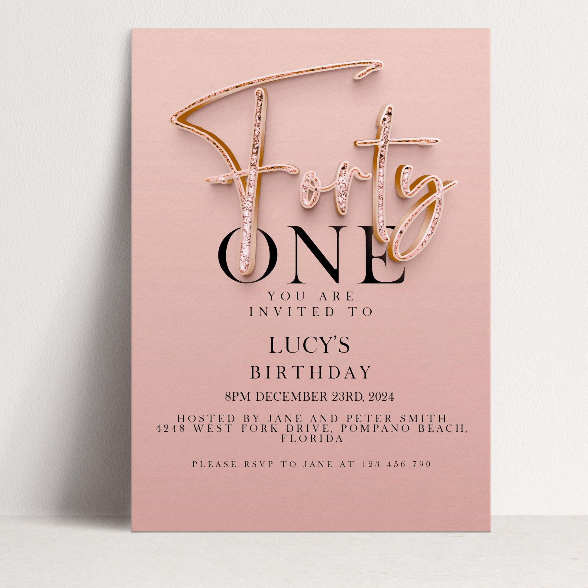 The image is a pink birthday invitation for a one-year-old named Lucy.