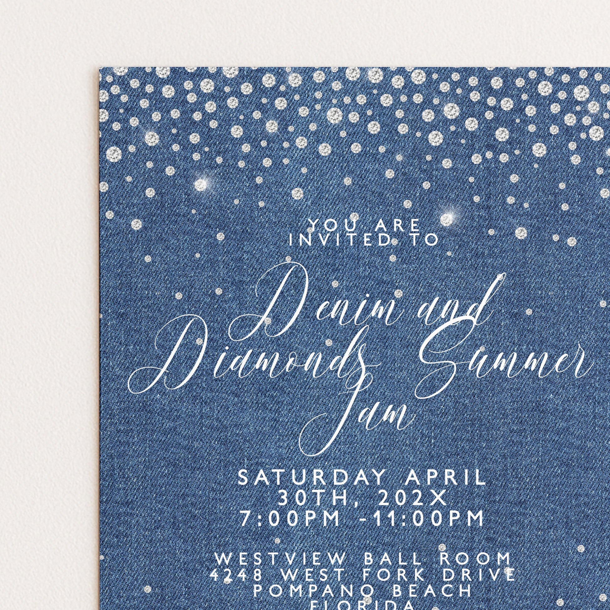 The image is a wedding invitation card with a denim theme, featuring a blue background with white sparkles and text inviting guests to a denim and diamond-themed summer party.