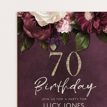 The image is a birthday invitation for a 70th celebration, featuring a floral design with white and burgundy flowers, along with the number 70 and the text "Join us for a party for LUCY JONES".