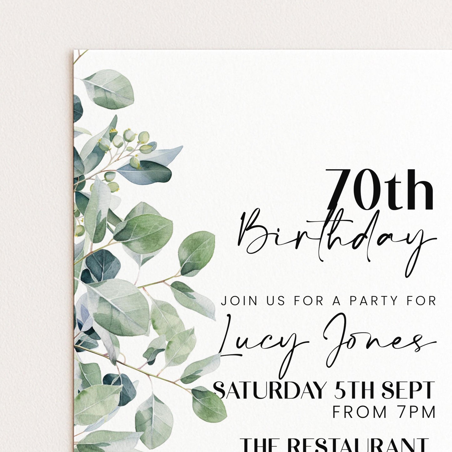 The image is a birthday party invitation for a 70th birthday celebration. It features a green leaf design and includes details about the party, such as the date, time, and location.
