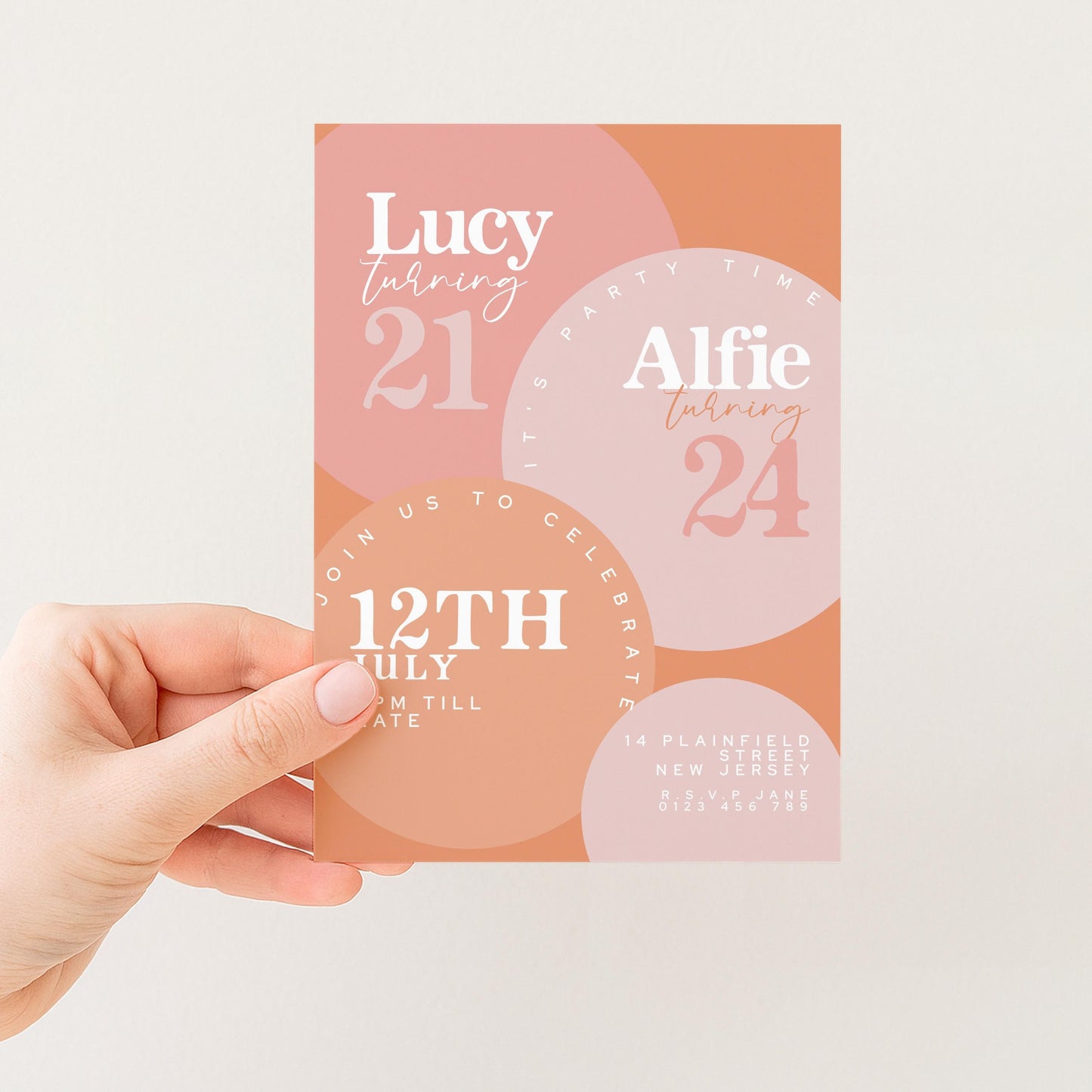 a hand holding a birthday invitation card with text and graphics.