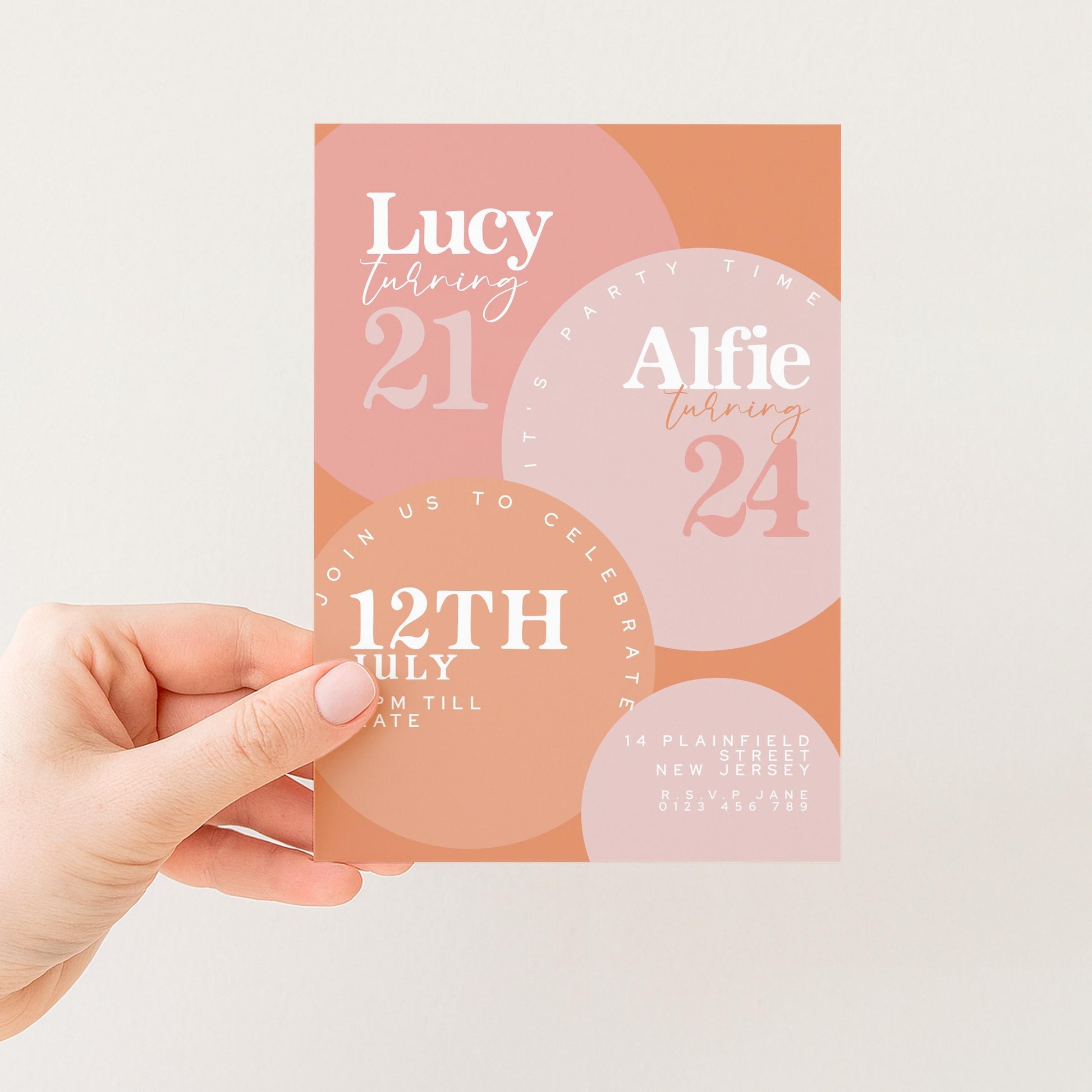 a hand holding a birthday invitation card with text and graphics.