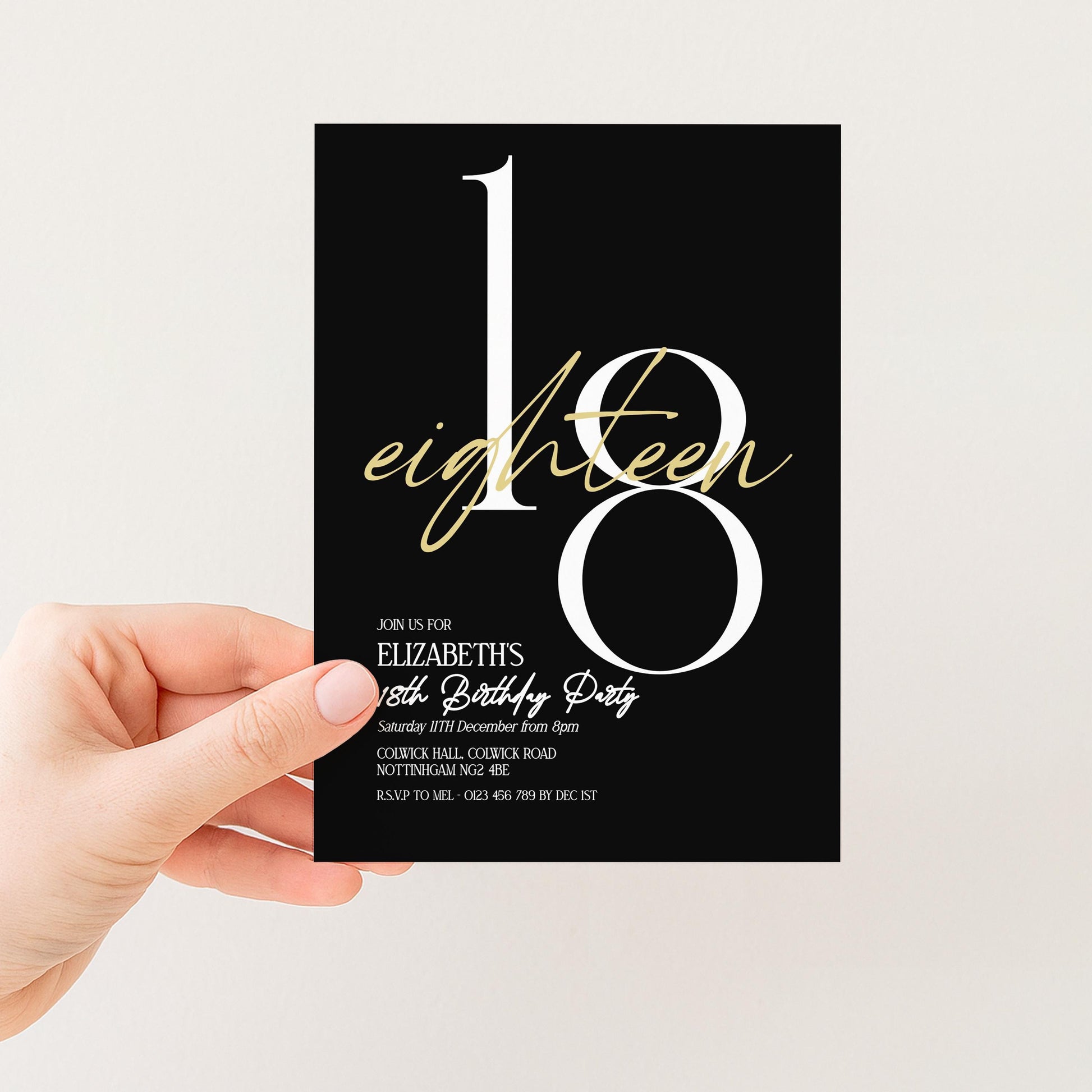 A hand holding a black and white invitation card with the number 18 prominently displayed.