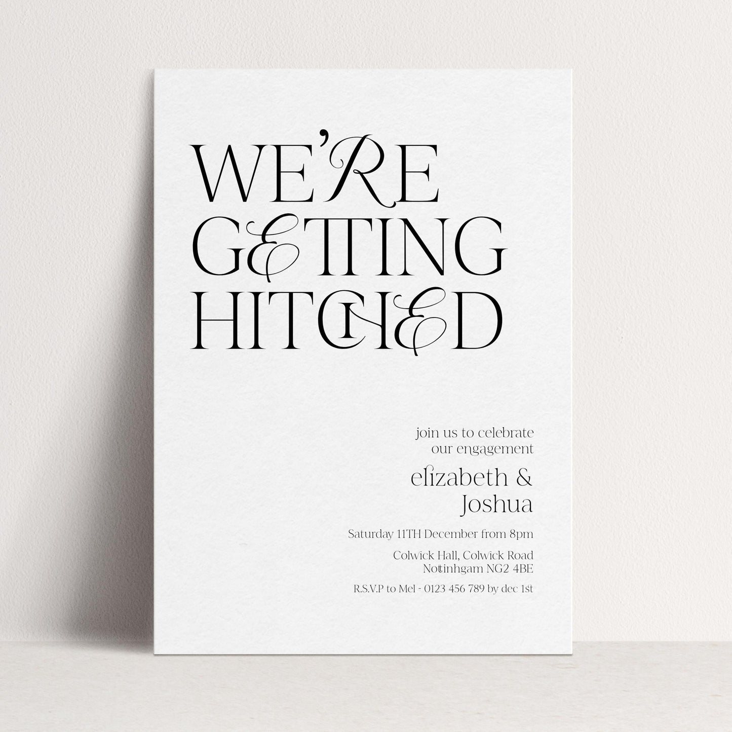 The image is a wedding invitation card with a minimalist design featuring the text "WE'RE GETTING HITCHED" in a large font.