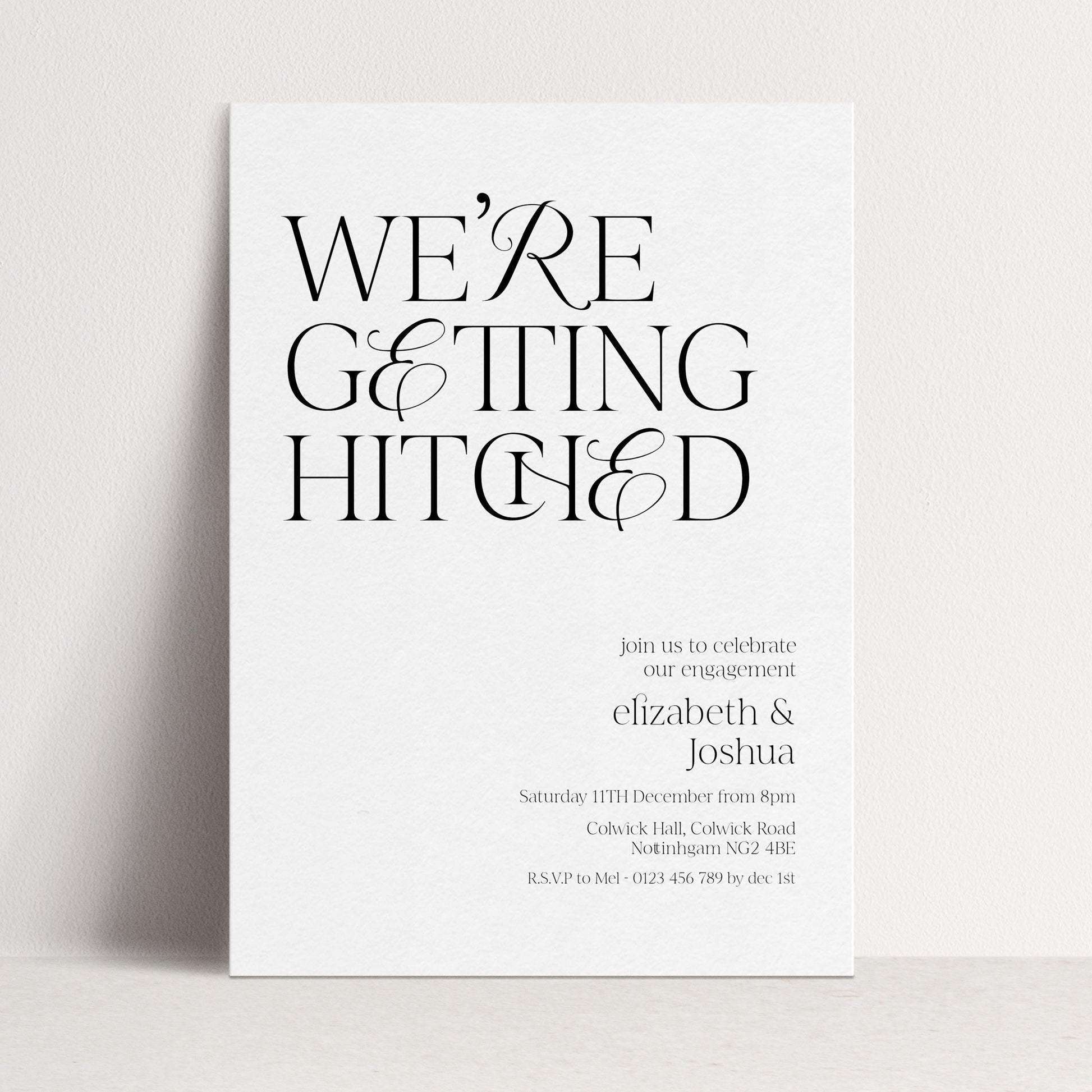 The image is a wedding invitation card with a minimalist design featuring the text "WE'RE GETTING HITCHED" in a large font.