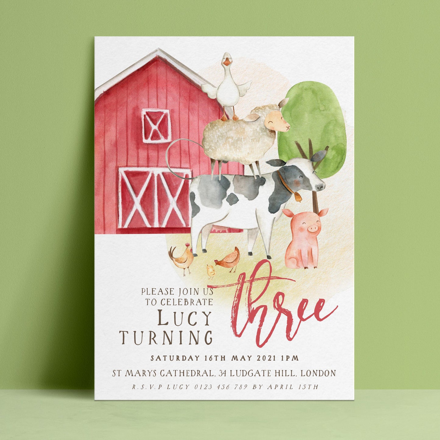 The image is a birthday invitation for a three-year-old girl named Lucy, featuring a red barn, farm animals, and a pink pig.