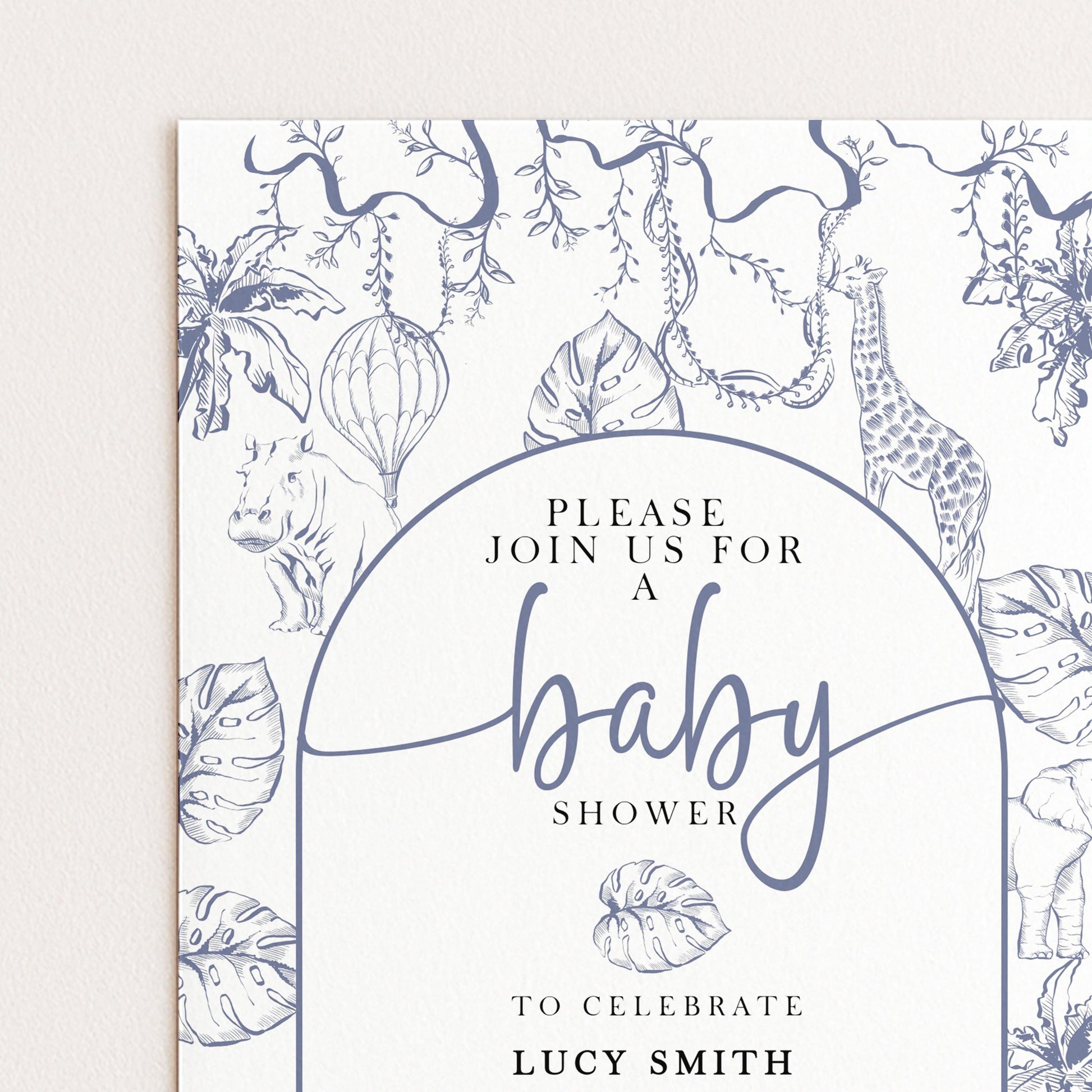 The image is a baby shower invitation featuring a jungle theme with illustrations of animals and plants. The invitation invites guests to "Join us for a baby shower" and includes the text "To celebrate LUCY SMITH".