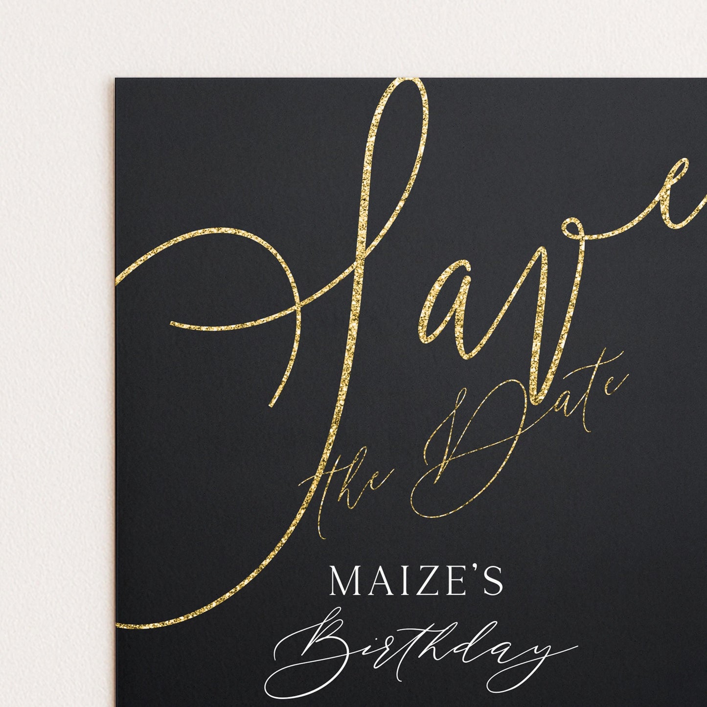 The image is a birthday card with a black background and gold glitter text.