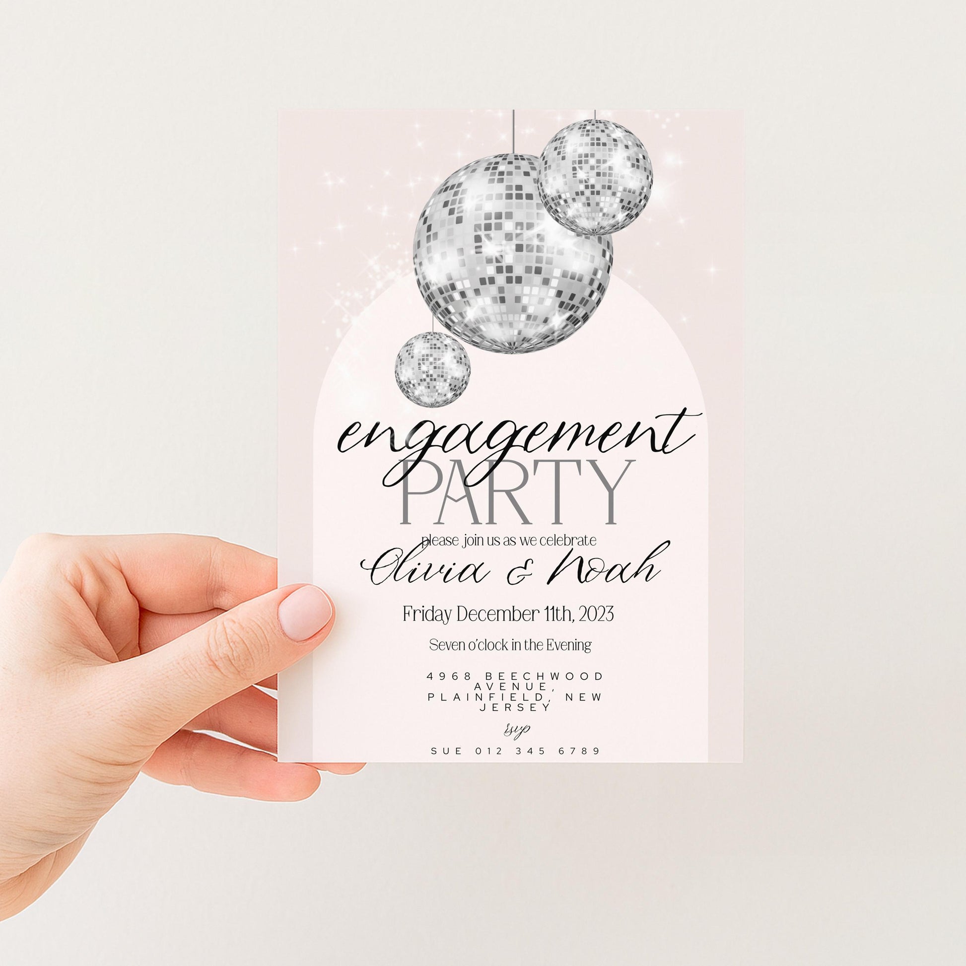 The image is a hand holding a party invitation card with a disco ball design.