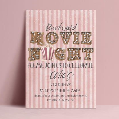 The image is a pink and white striped invitation card for a backyard movie night celebration.