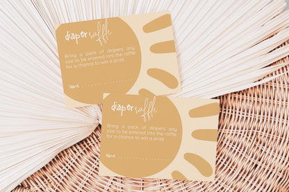 two beige cards with text and illustrations, placed on a woven surface.
