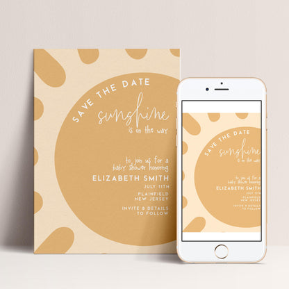 a "Save the Date" invitation for a baby shower, featuring a large, circular design with a sun-like pattern. The invitation is presented in two formats: a printed card and a smartphone screen displaying the same design.