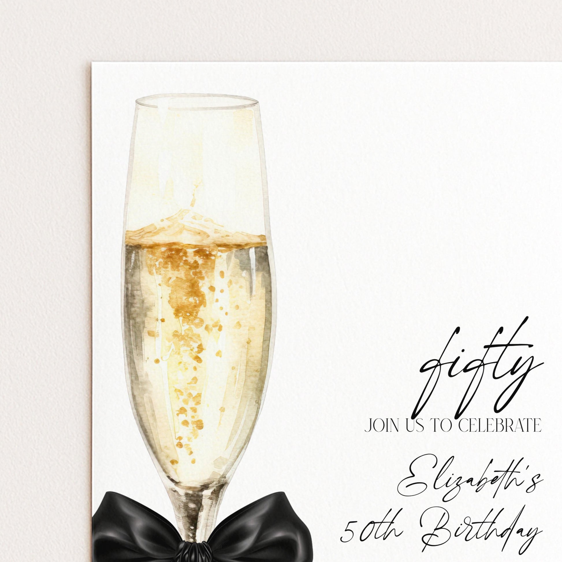 a glass of champagne with a black bow, accompanied by the text "Join us to celebrate Elizabeth's 50th birthday"