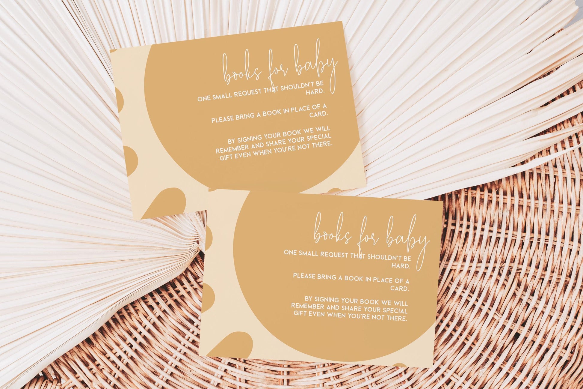 Two beige cards with text on them, placed on a woven surface.