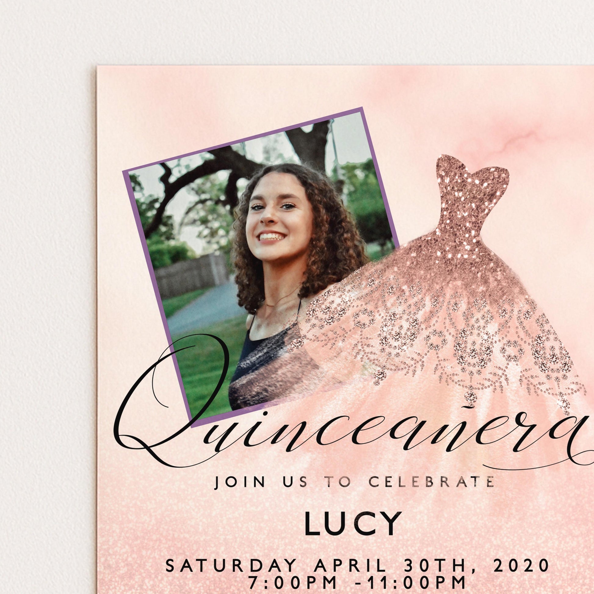 The image is a pink and white invitation card for a quinceañera celebration. It features a photo of a smiling young woman wearing a dress, and a glittery pink dress. The card invites guests to join the celebration and includes the date, time, and location of the event.