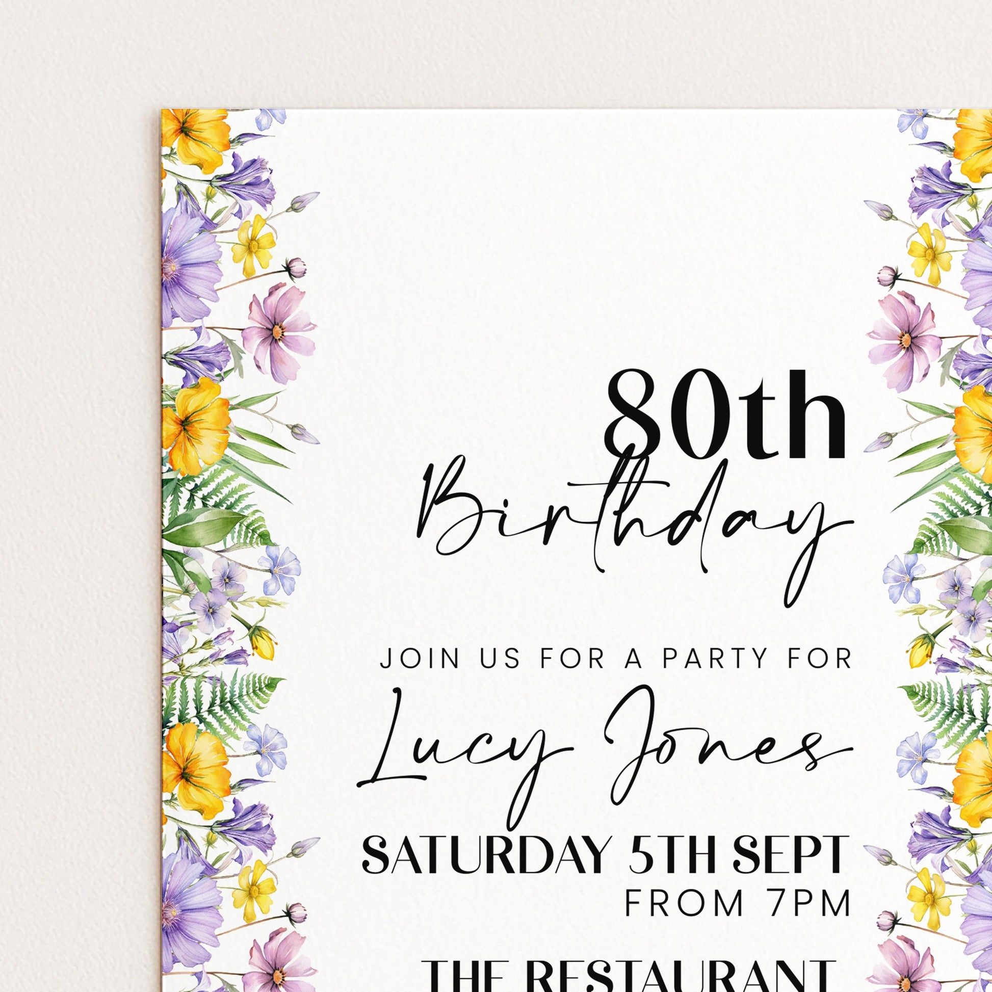 The image is a birthday invitation for a party for Lucy Jones, celebrating her 80th birthday.