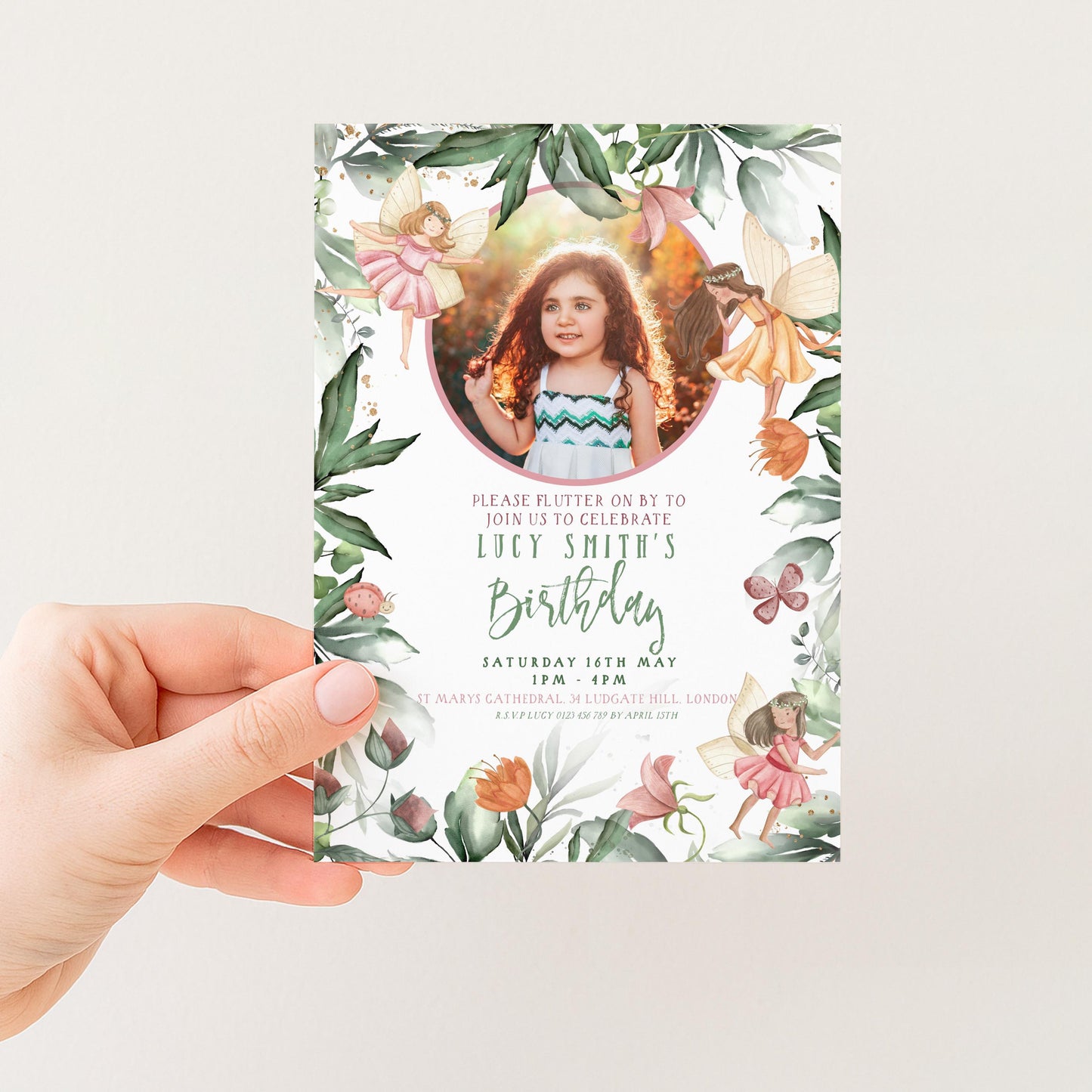 The image is a birthday invitation card featuring a young girl surrounded by fairy and floral elements.